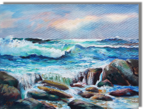 As evening draws in, waves roll in toward the rocky shore